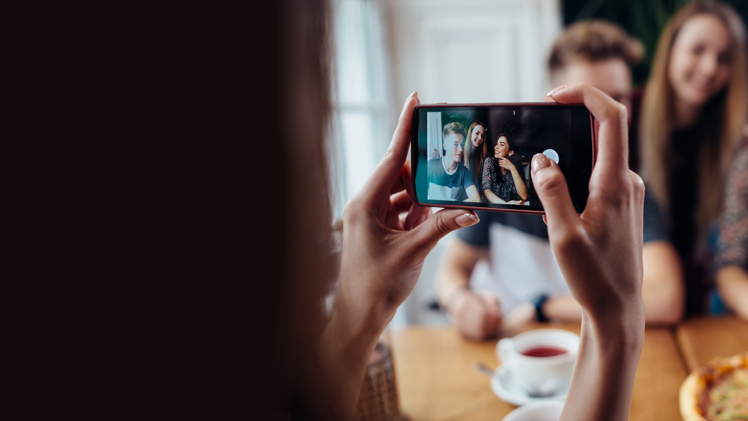 Taking photo of friends