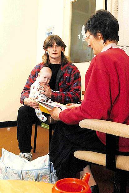 Father with baby and nurse, Shire of Yarra Ranges, 1995. Courtesy of the Public Record Office Victoria.