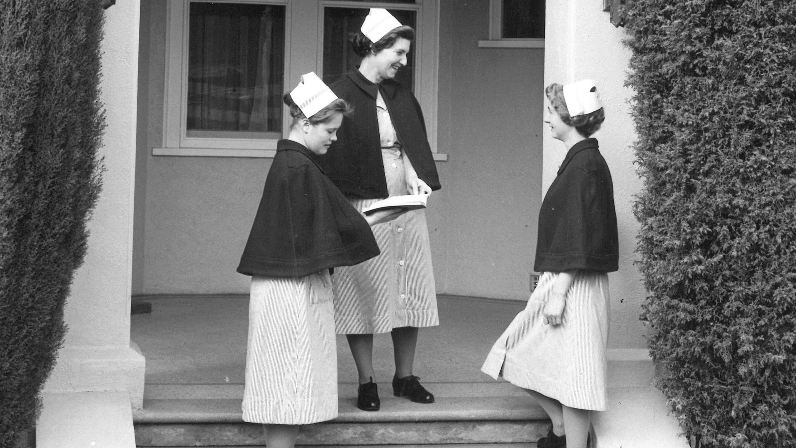 Students in uniform at the entrance to main hostel. Photo: Nursing Aide School annual report 1961-62